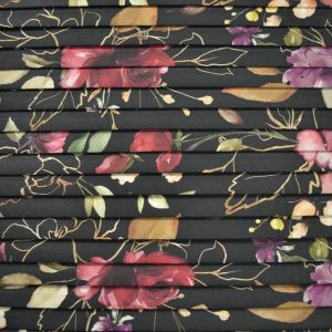 Mousseline polyester plissé fleurs d´or sur noir